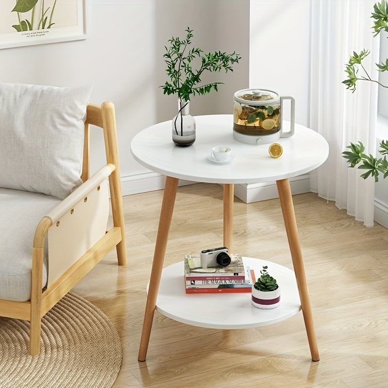A White Single-layer Living Room Side Table. It Features A Modern Furniture Style And Is Suitable For Taking Photos In Cafes. It Is A Practical Table With A Metal Frame.