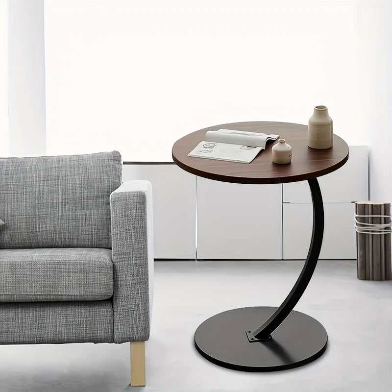 A Modern And Minimalist Columnar - Footed Table with A Metal Frame And A Wooden Tabletop. It Features A Portable Design, Making It Convenient for Indoor Use.