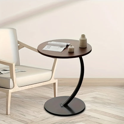 A Modern And Minimalist Columnar - Footed Table with A Metal Frame And A Wooden Tabletop. It Features A Portable Design, Making It Convenient for Indoor Use.