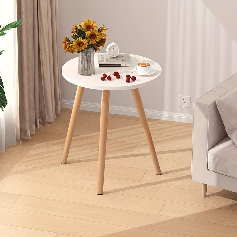 A White Single-layer Living Room Side Table. It Features A Modern Furniture Style And Is Suitable For Taking Photos In Cafes. It Is A Practical Table With A Metal Frame.