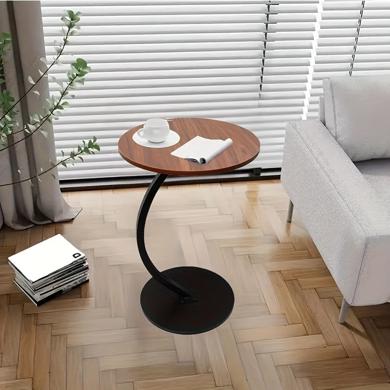 A Modern And Minimalist Columnar - Footed Table with A Metal Frame And A Wooden Tabletop. It Features A Portable Design, Making It Convenient for Indoor Use.